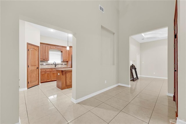 3120 La Puerta Ave, Edinburg, TX 78541 - corridor featuring light tile patterned flooring