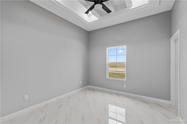 519 Oriole Dr, Los Fresnos, TX 78566 - unfurnished room with baseboards, marble finish floor, and ceiling fan