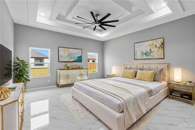 519 Oriole Dr, Los Fresnos, TX 78566 - bedroom with a tray ceiling, baseboards, marble finish floor, and ceiling fan