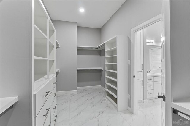 519 Oriole Dr, Los Fresnos, TX 78566 - spacious closet featuring marble finish floor and a sink