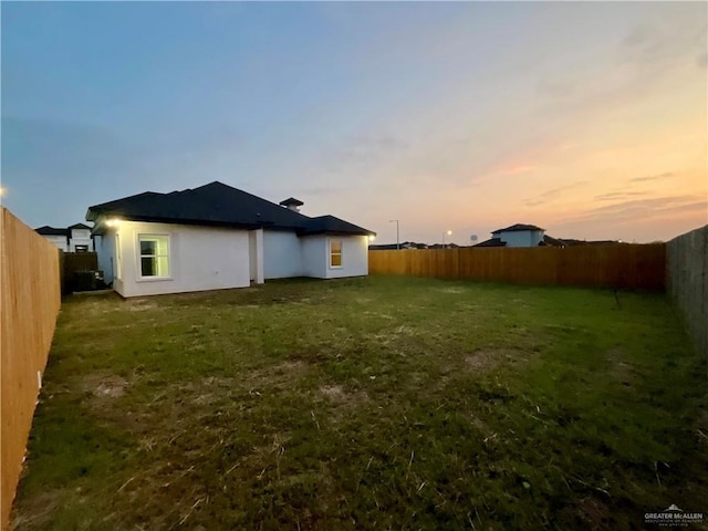 exterior space featuring a fenced backyard