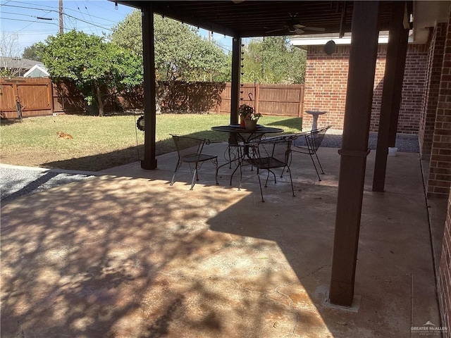 view of patio featuring ceiling fan