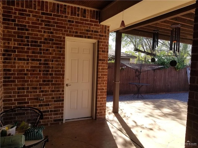 doorway to property featuring a patio