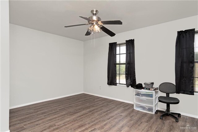 1309 El Camino Dr, Weslaco, TX 78599 - office area with wood finished floors, ceiling fan, and baseboards