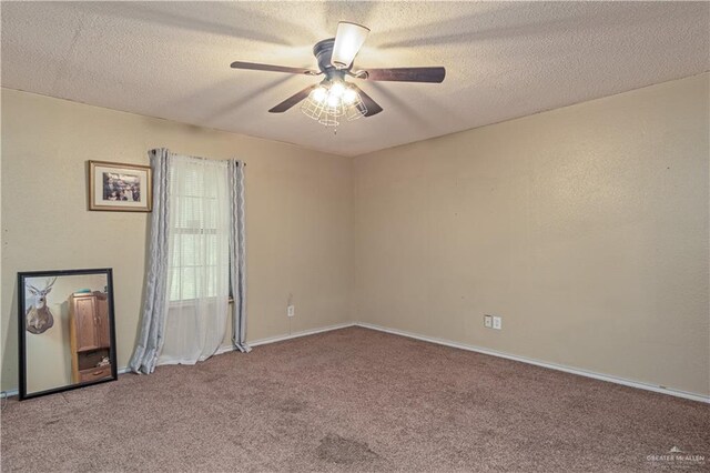 1309 El Camino Dr, Weslaco, TX 78599 - carpeted empty room featuring ceiling fan, baseboards, and a textured ceiling