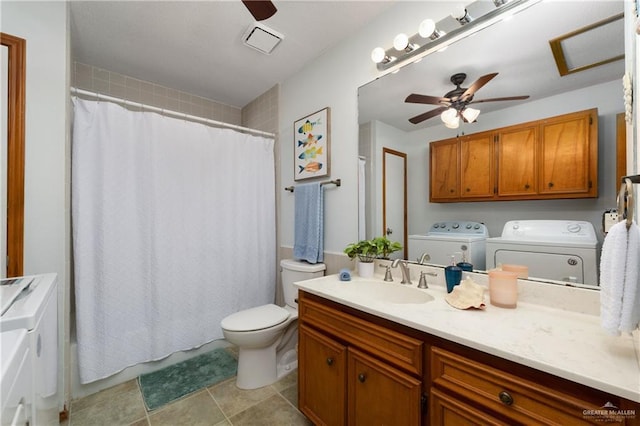 130 E Gardenia St, South Padre Island, TX 78597 - full bath featuring visible vents, washing machine and clothes dryer, toilet, and ceiling fan