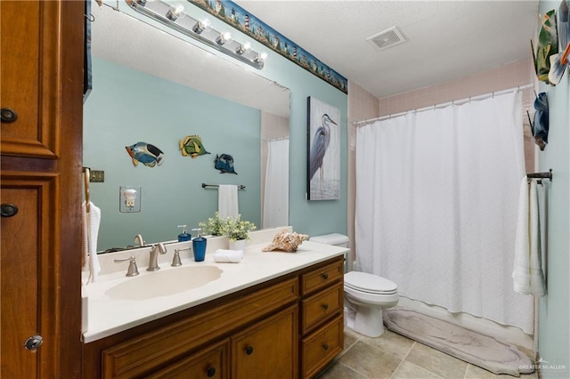 130 E Gardenia St, South Padre Island, TX 78597 - full bathroom featuring visible vents, toilet, shower / bath combo with shower curtain, and vanity
