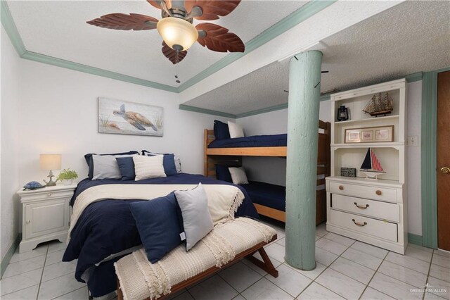 130 E Gardenia St, South Padre Island, TX 78597 - bedroom featuring crown molding, baseboards, ceiling fan, and light tile patterned flooring