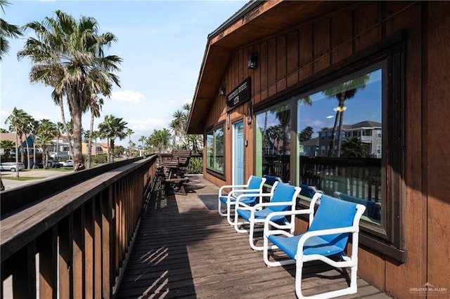 130 E Gardenia St, South Padre Island, TX 78597 - wooden deck featuring a residential view