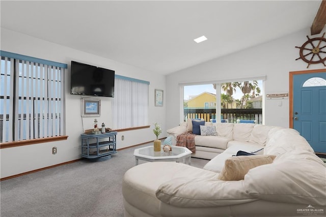 130 E Gardenia St, South Padre Island, TX 78597 - carpeted living room with baseboards and vaulted ceiling