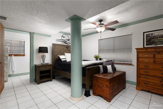 130 E Gardenia St, South Padre Island, TX 78597 - bedroom with baseboards, a textured ceiling, a ceiling fan, light tile patterned flooring, and visible vents