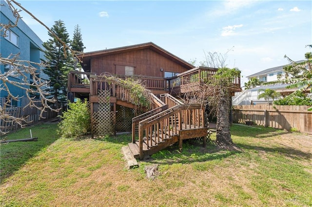 130 E Gardenia St, South Padre Island, TX 78597 - view of yard with stairs, a deck, and fence