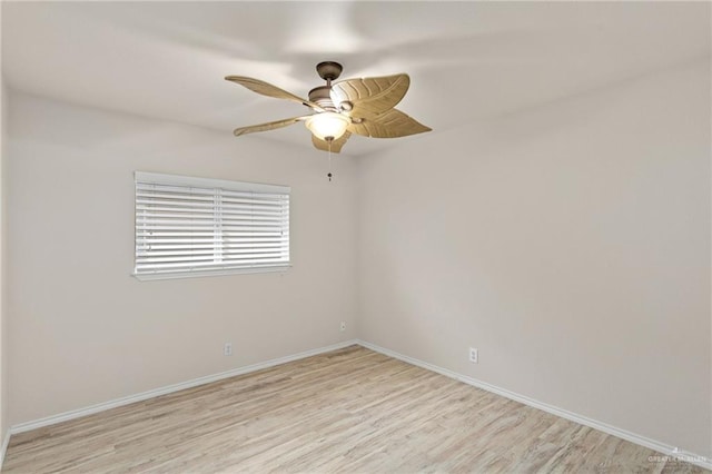 spare room with ceiling fan and light hardwood / wood-style flooring