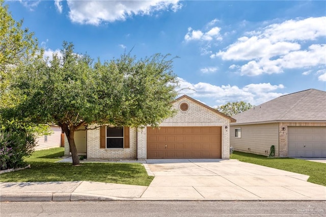 125 Katie Ct, Boerne, TX 78006 - view of front facade with an attached garage, brick siding, a front yard, and concrete driveway