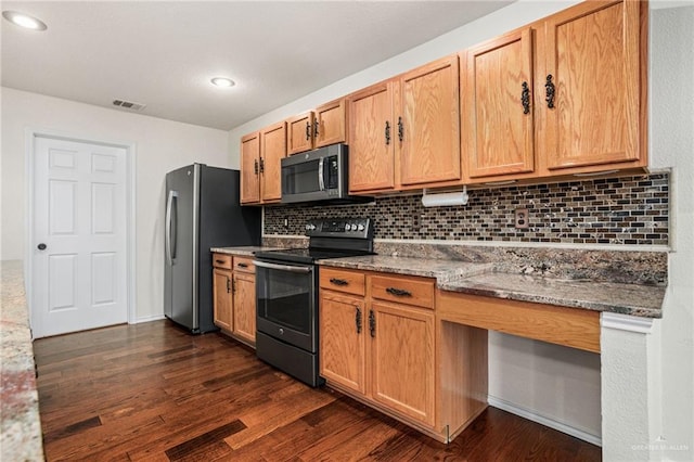 125 Katie Ct, Boerne, TX 78006 - kitchen with range with electric stovetop, freestanding refrigerator, dark wood finished floors, decorative backsplash, and light stone counters
