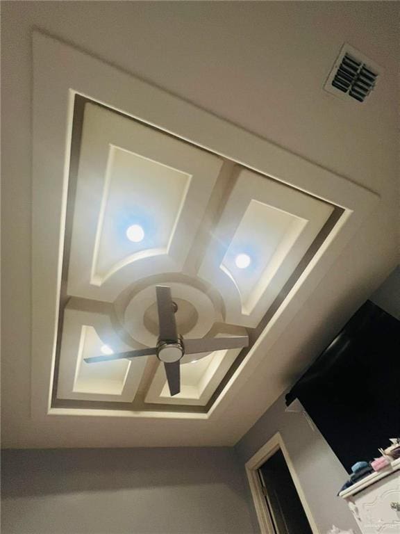 interior details featuring ceiling fan