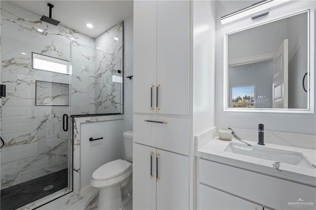 full bath featuring toilet, marble finish floor, recessed lighting, a marble finish shower, and vanity