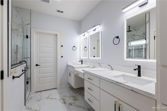 bathroom with vanity, visible vents, marble finish floor, and a marble finish shower