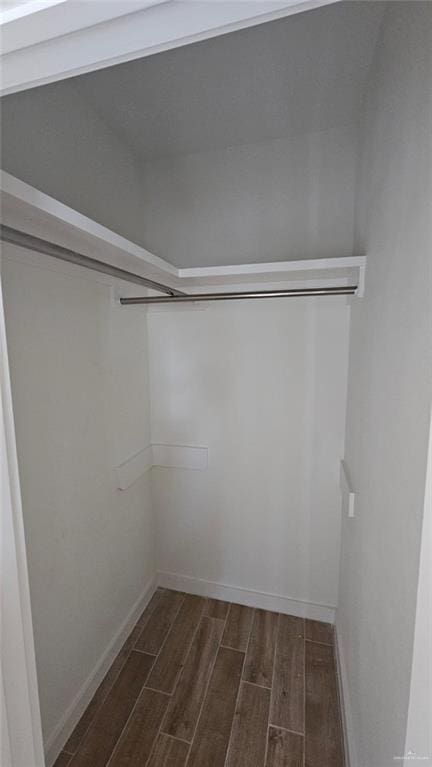 2721 Chesterfield Ave, Edinburg, TX 78539 - walk in closet with wood tiled floors