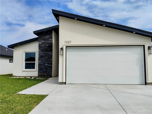 garage with driveway