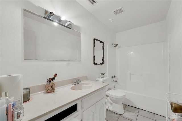 3019 Floresta St, Edinburg, TX 78541 - full bath featuring vanity, toilet, tub / shower combination, and tile patterned floors