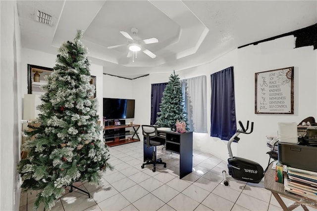 3019 Floresta St, Edinburg, TX 78541 - tiled office featuring a ceiling fan and a raised ceiling