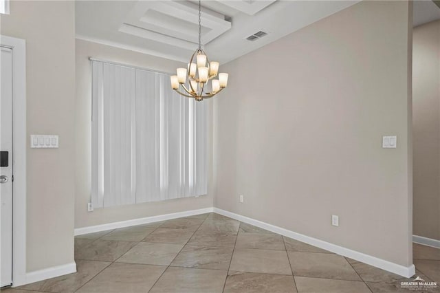 unfurnished dining area with a notable chandelier, visible vents, and baseboards
