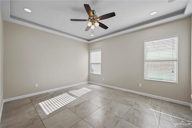 spare room with crown molding, recessed lighting, a ceiling fan, and baseboards