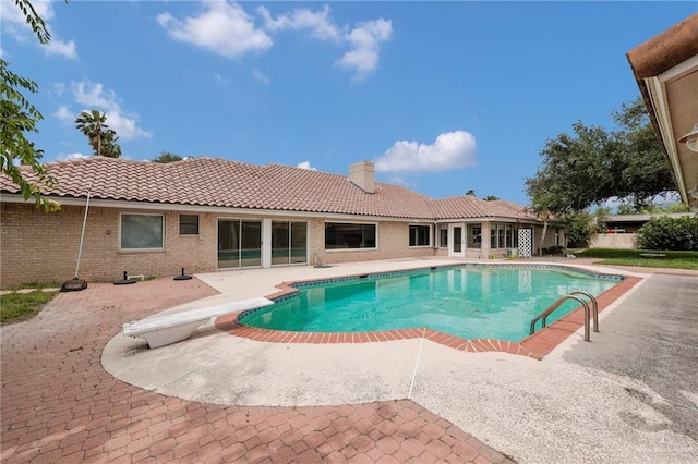 view of pool featuring a patio and a fenced in pool