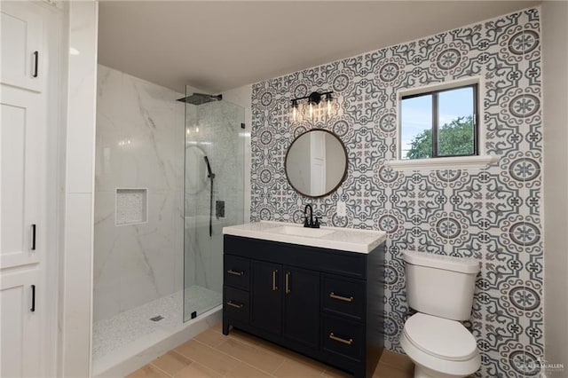 1817 Dolores Del Rio Ave, Mission, TX 78572 - bathroom featuring a marble finish shower, vanity, toilet, and tile patterned floors