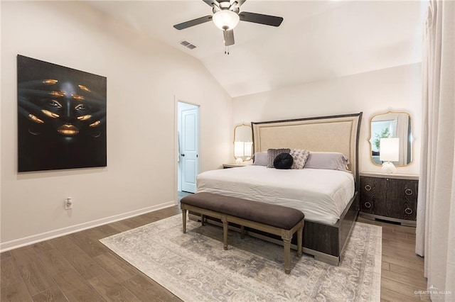 bedroom featuring lofted ceiling, hardwood / wood-style floors, and ceiling fan