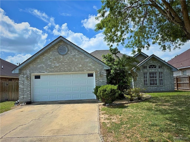 ranch-style home with fence, driveway, and a front yard