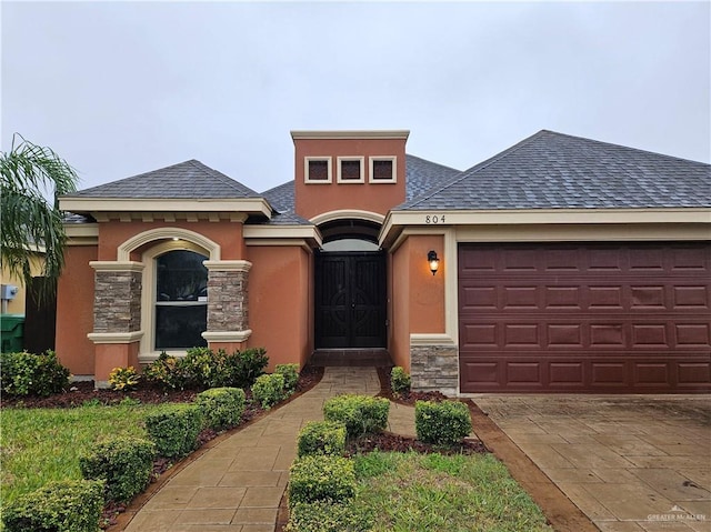 view of front of home featuring a garage