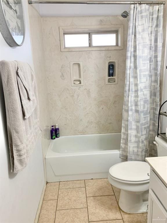 full bathroom with tile patterned floors, vanity, toilet, and shower / bath combo