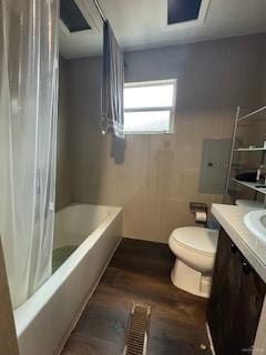 full bathroom with vanity, wood-type flooring, shower / tub combo, and toilet