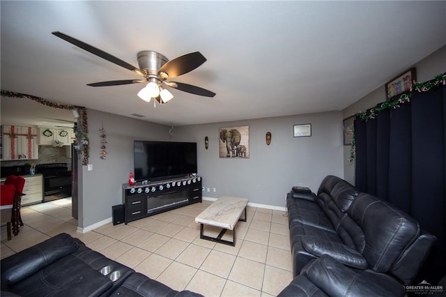 living room with light tile patterned floors and ceiling fan