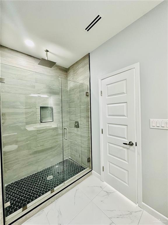 bathroom with walk in shower