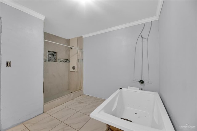 bathroom featuring a tile shower and crown molding