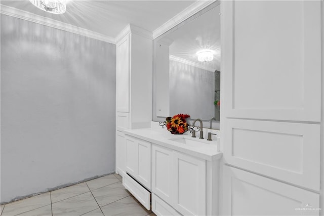 bathroom featuring a notable chandelier, vanity, and crown molding