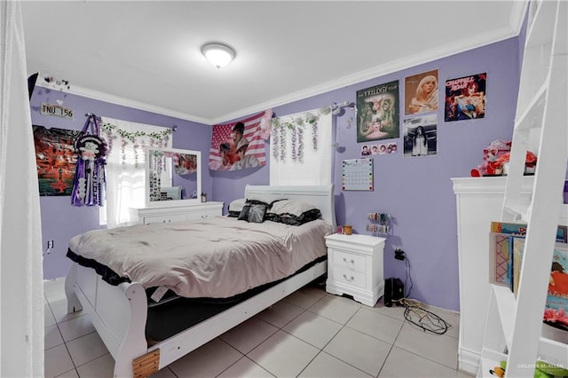 tiled bedroom featuring multiple windows and ornamental molding