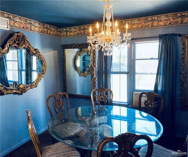1113 W Maple Ave, Mcallen, TX 78501 - carpeted dining space featuring a chandelier and plenty of natural light