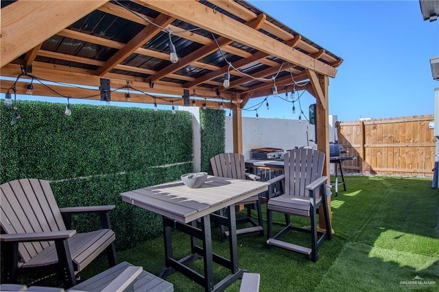 view of patio / terrace featuring fence