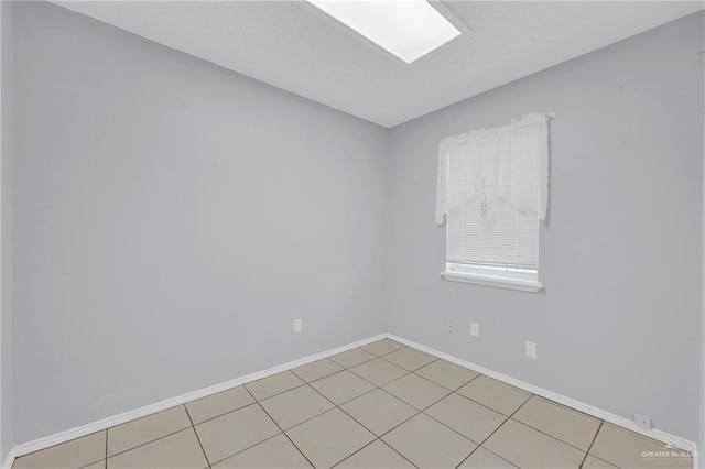 517 Gemini St, Mission, TX 78572 - unfurnished room with baseboards and light tile patterned flooring