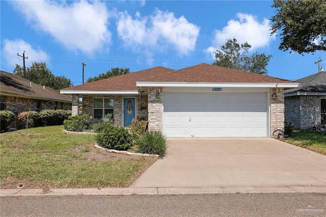 517 Gemini St, Mission, TX 78572 - ranch-style house with an attached garage, driveway, a front lawn, and brick siding