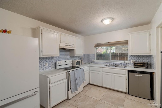 3301 Princeton Ave, Mcallen, TX 78504 - kitchen featuring white appliances, a sink, under cabinet range hood, light countertops, and a textured ceiling