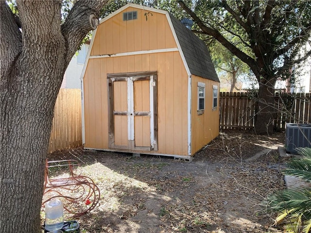 view of outbuilding featuring cooling unit