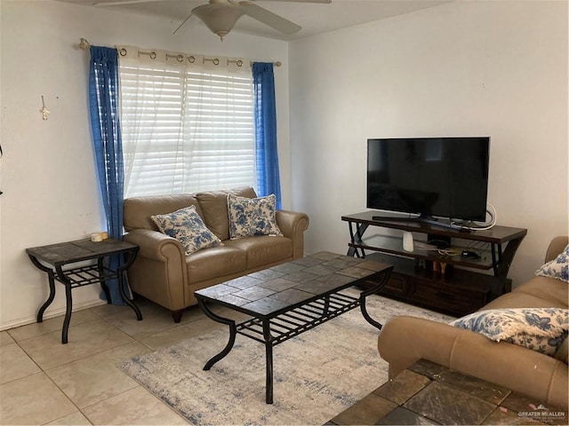 living room with light tile patterned floors and ceiling fan