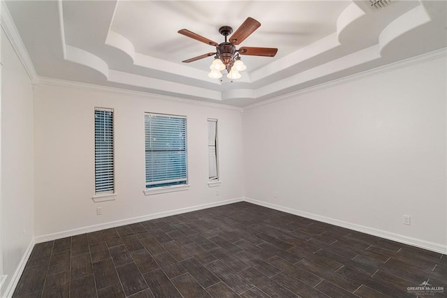 3909 S M St, Mcallen, TX 78503 - empty room with a tray ceiling, ceiling fan, wood finish floors, baseboards, and ornamental molding