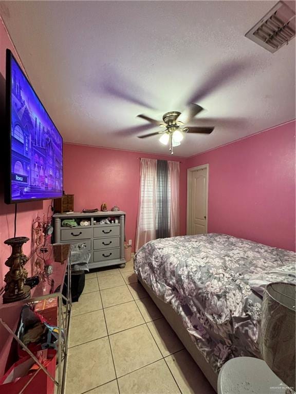 704 S 17th St, Hidalgo, TX 78557 - bedroom with light tile patterned floors and ceiling fan