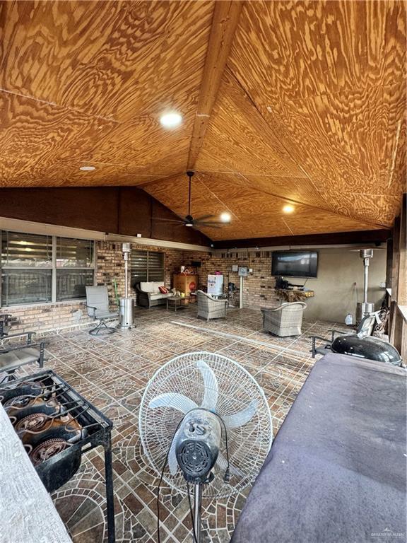 704 S 17th St, Hidalgo, TX 78557 - living area featuring wooden ceiling, lofted ceiling, a ceiling fan, and recessed lighting